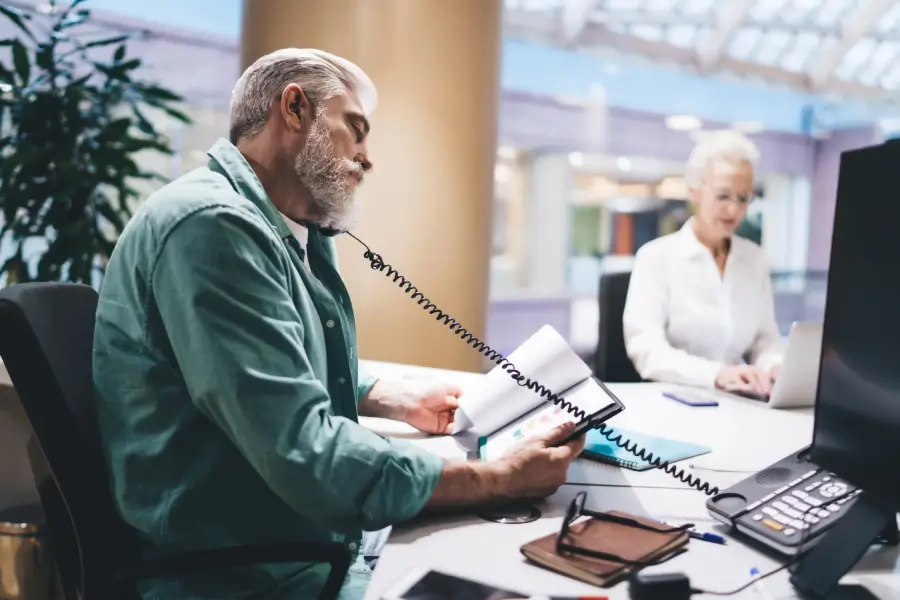 City park manager speaking on the phone