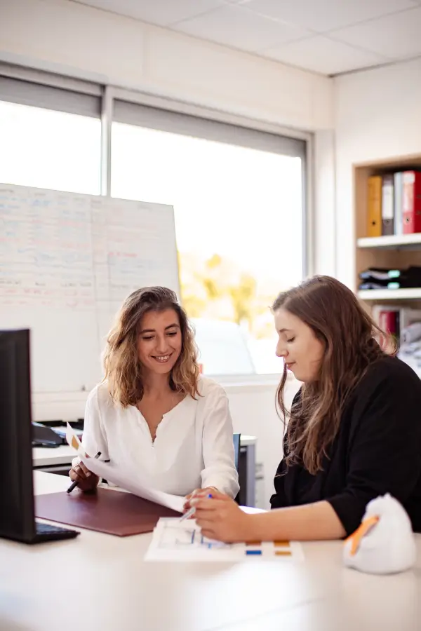 Office managers of service company at work